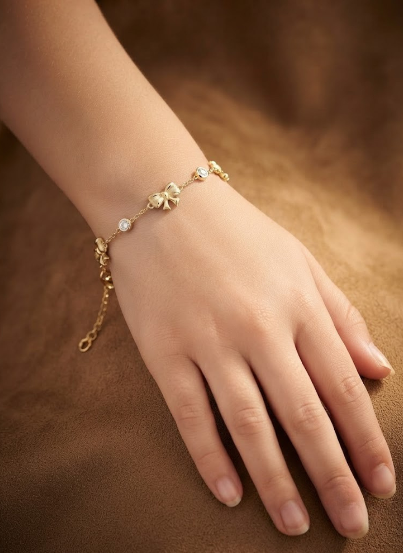 Delicate Gold Bow Charm Bracelet