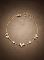 Delicate Gold Bow Charm Bracelet -  - Luxeria