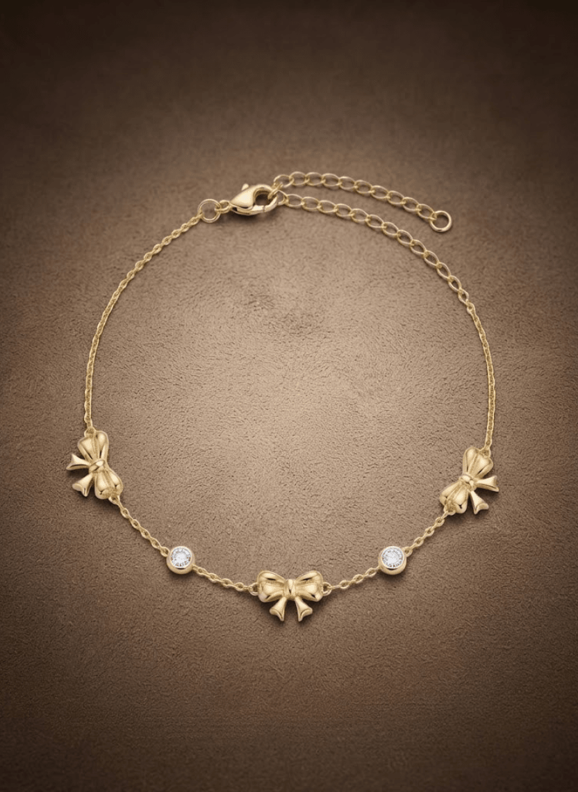 Delicate Gold Bow Charm Bracelet -  - Luxeria