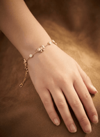 Delicate Gold Bow Charm Bracelet -  - Luxeria